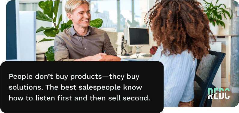 Image: A salesperson and client shaking hands over a desk. Text: People don't buy products. They buy solutions. The best salespeople know how to listen first and then sell second.