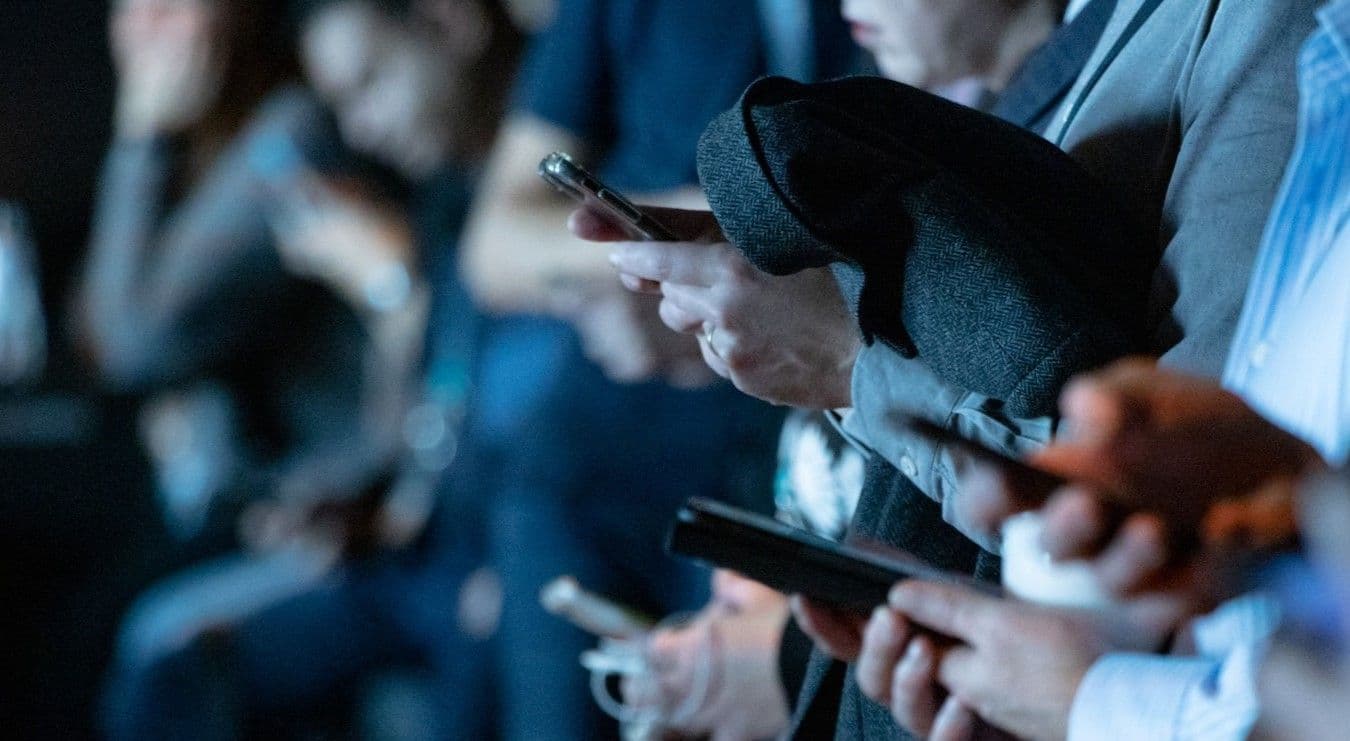 People using their smart phones