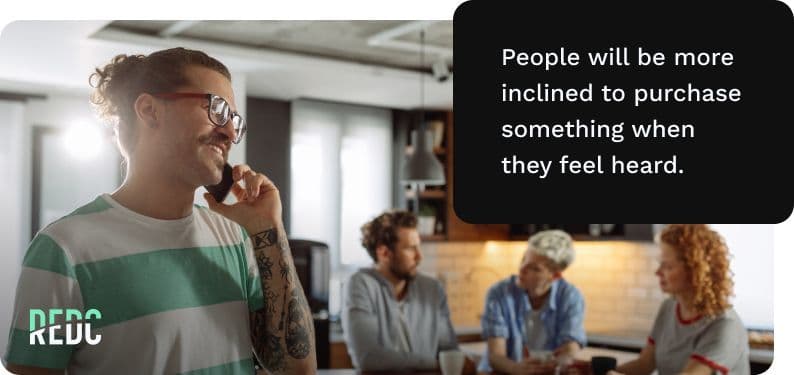 A salesperson on the phone in an office. 