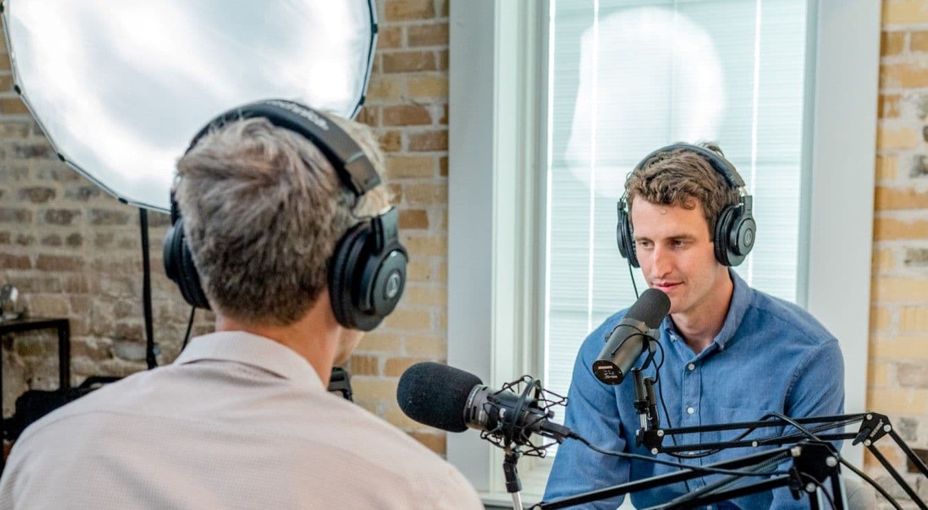Man being interviewed in a studio