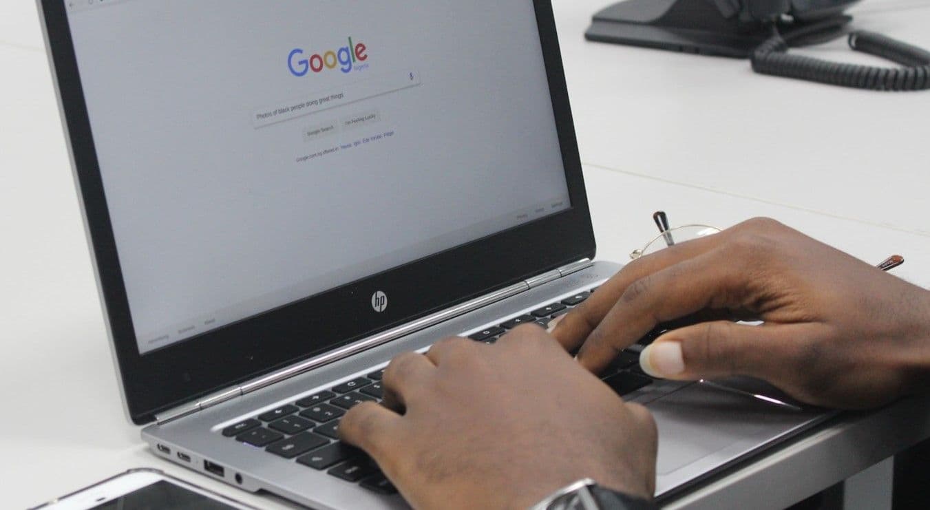 Man searching internet using Google