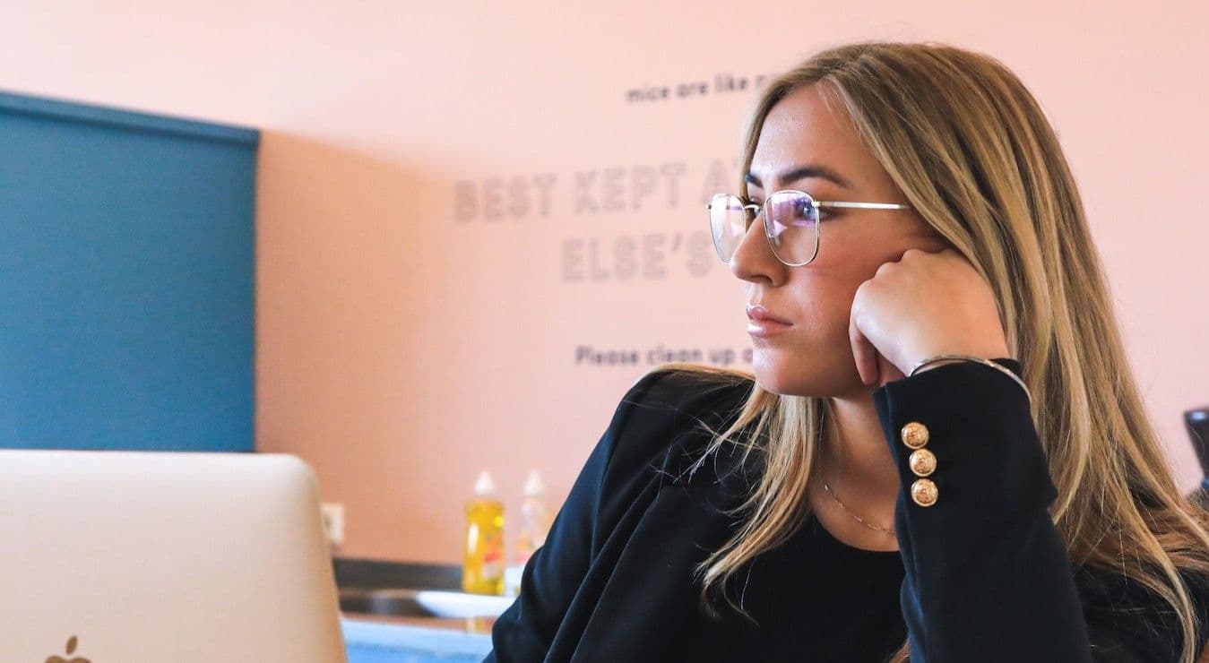 Woman thinking at work